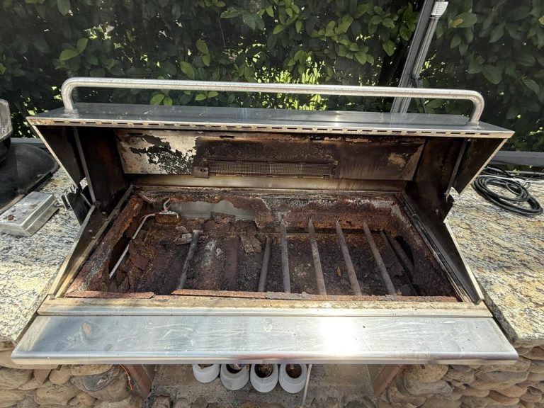 Outdoor kitchen upgraded from an old built-in grill to a new 48 inch grill (photo 1)
