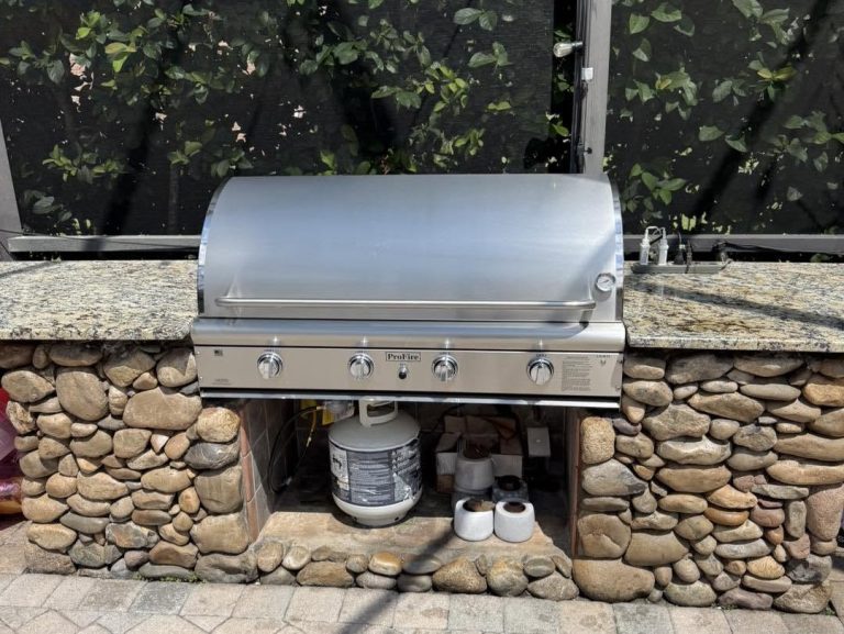 Outdoor kitchen upgraded from an old built-in grill to a new 48 inch grill (photo 2)