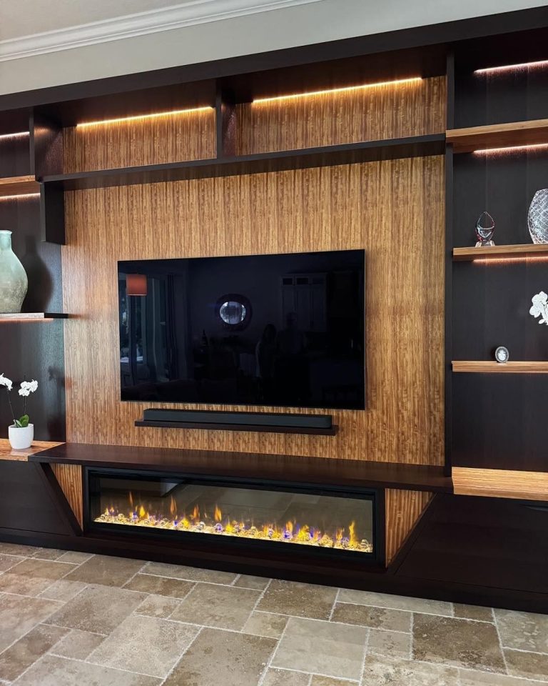74 inch Dimplex Ignite Evolve electric fireplace in a custom feature wall (photo 1)