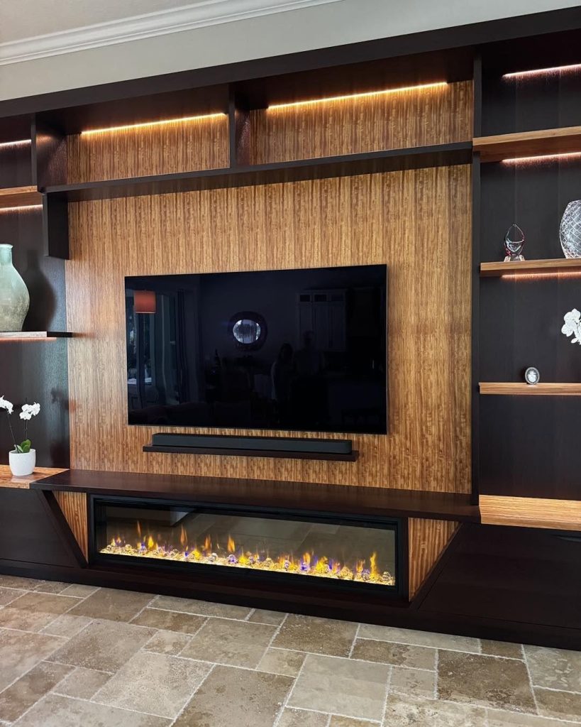 74 inch Dimplex Ignite Evolve electric fireplace in a custom feature wall (photo 1)