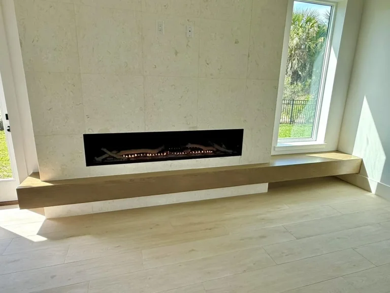 72 inch linear gas fireplace with a floating wood hearth