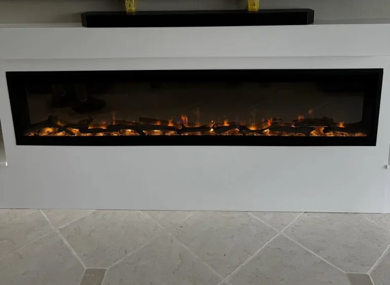 74 inch Dimplex Evolve linear electric fireplace in a white wall