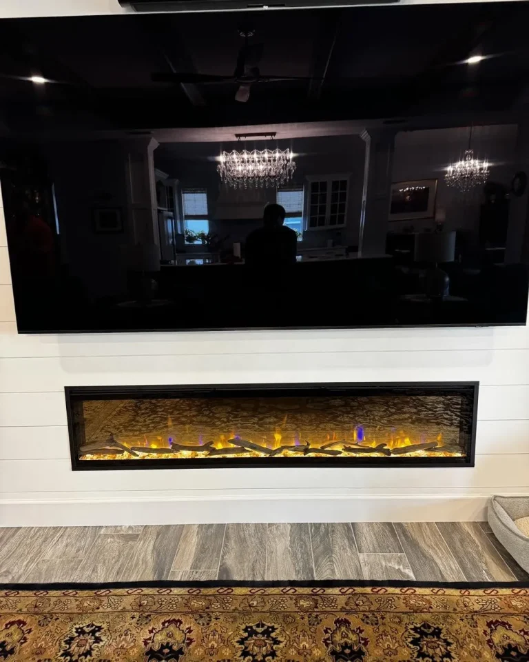 74 inch Dimplex Ignite Evolve electric fireplace in a shiplap wall