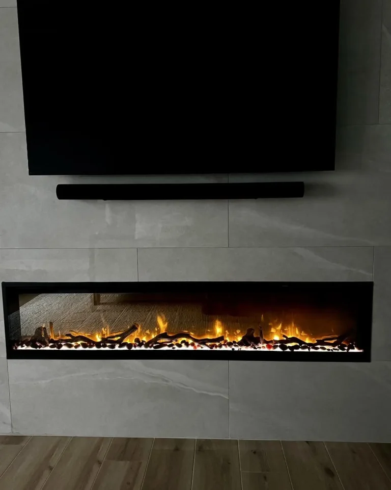 Dimplex Ignite XL linear electric fireplace on a tiled media wall
