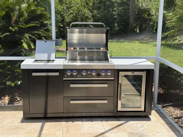 Mont Alpi black stainless modular outdoor kitchen on a screened lanai