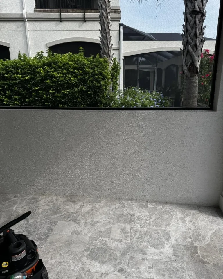 Before and after of an outdoor kitchen built on a covered lanai