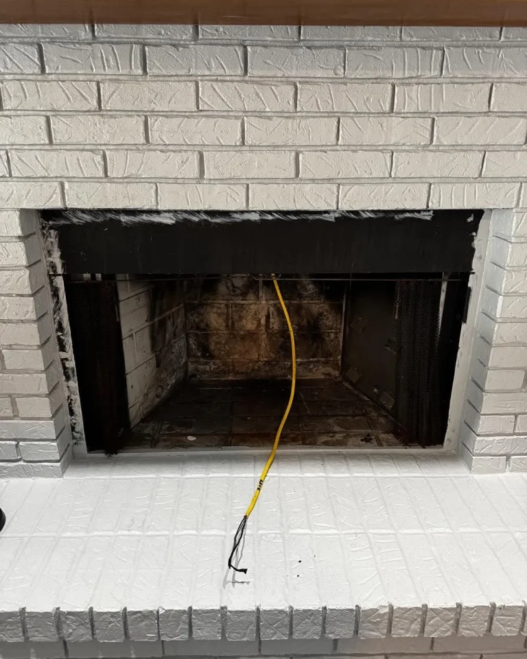 Painted brick fireplace updated with a Valor GE4 electric fireplace